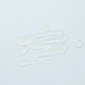 Image of the Woohoo Glow FG Serum 1 formula on a light blue background