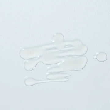 Image of the Woohoo Glow FG Serum 1 formula on a light blue background