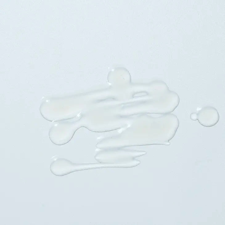 Image of the Woohoo Glow FG Serum 1 formula on a light blue background