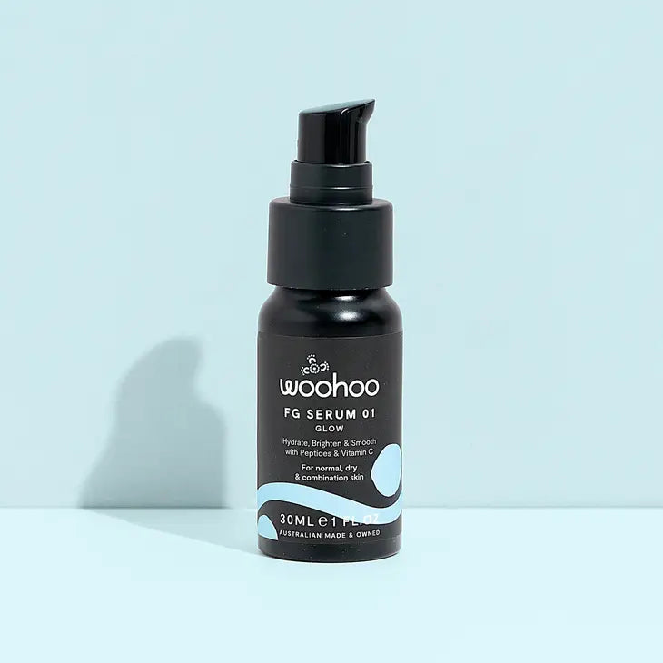 Image of the Woohoo Glow FG Serum 1 bottle with pump on a light blue background