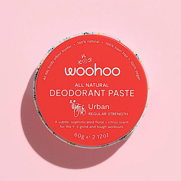 Image of the Woohoo Urban Natural Deodorant Paste tin on a pink background
