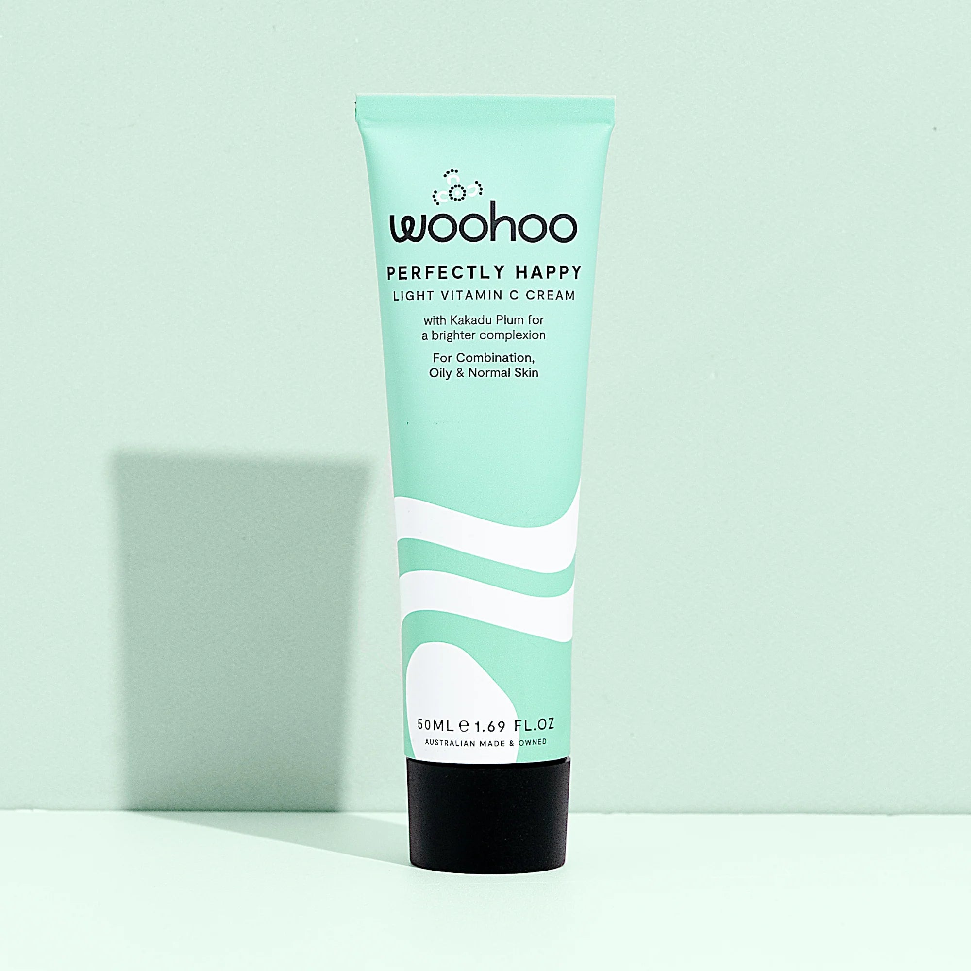 Image of the Woohoo Perfectly Happy Light Vitamin C Cream tube on a light green background